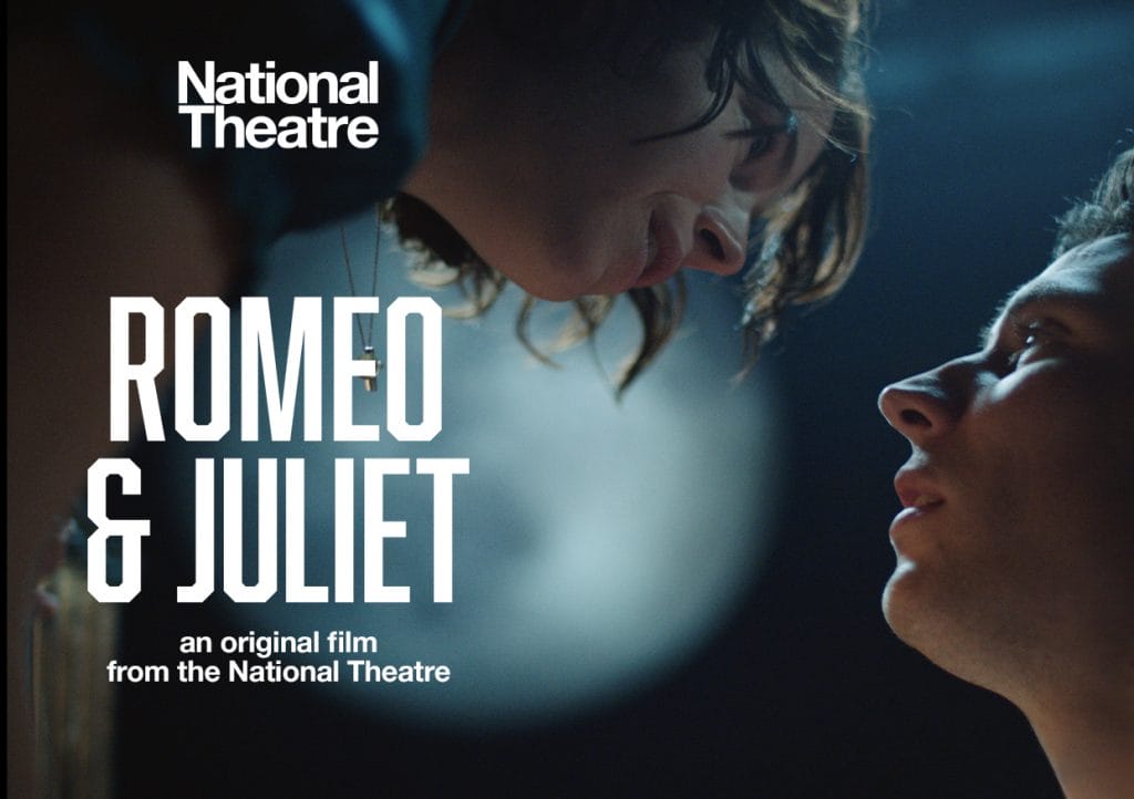 A young man and a young woman stare into one another's eyes. Romeo & Juliet