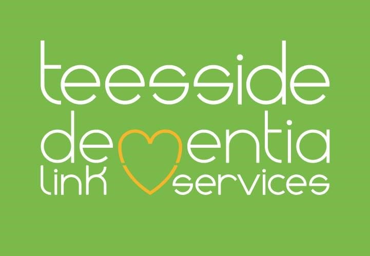 Green background with white text teesside dementia link services. The M in dementia is a yellow love heart