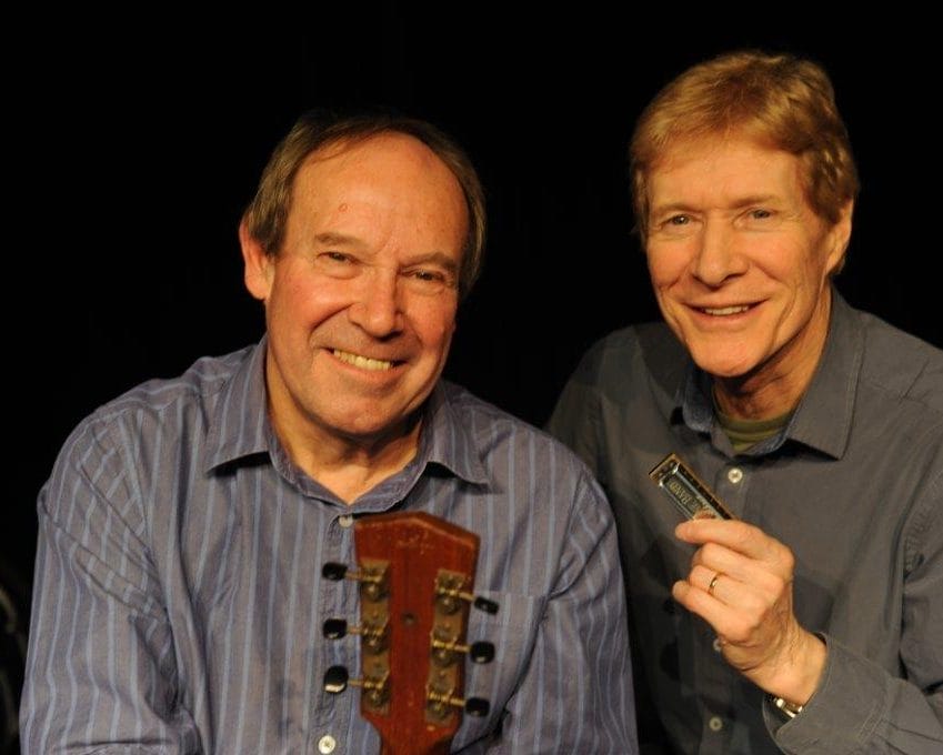 Paul Jones and Dave Kelly, one is holding a guitar