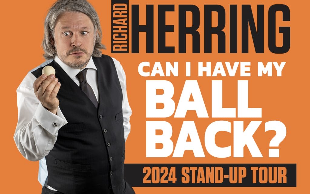 Richard Herring, a man with collar length grey hair, wearing a white shirt, and dark waistcoat and tie, is holding up a small ball and looking dubiously at it. Text: Avalon Presents Richard Herring Can I Have My Ball Back? 2024 Stand-Up Tour