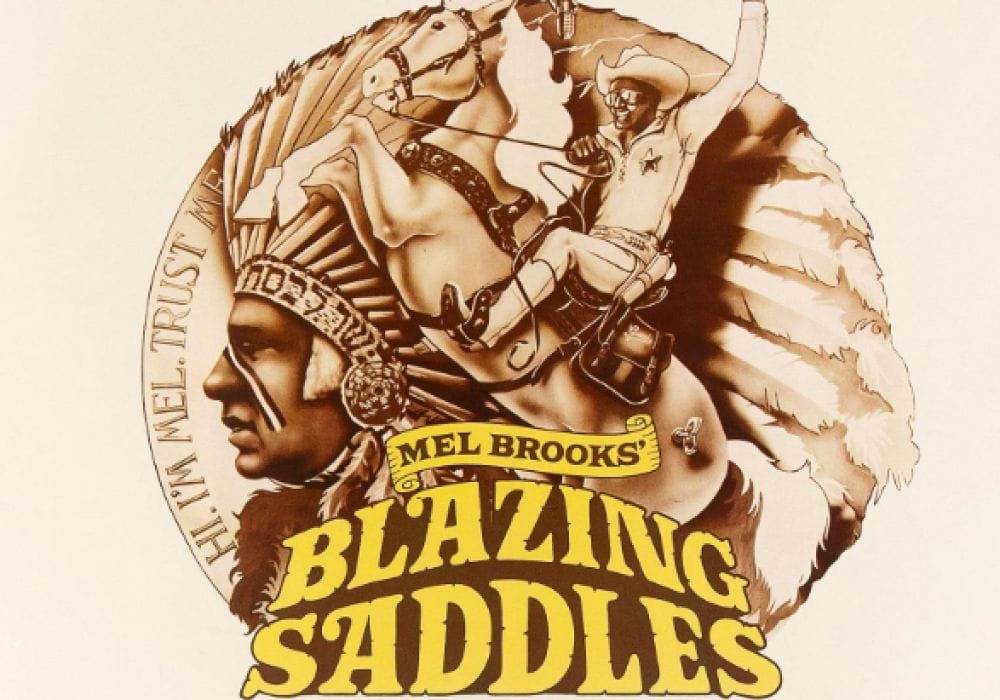 Tinted brown logo of Blazing Saddles featuring horseback rider and tribe member