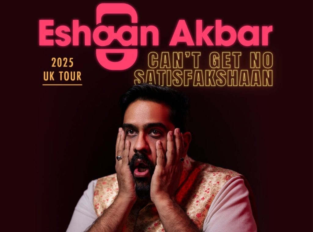 Comedian Eshaan Akbar, a brown-skinned man with short black hair and a small beard, has his head in his hands. Text reads Eshaan Akbar Can't Get No Satisfakshaan