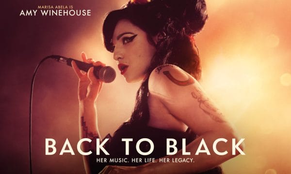 Amy Winehouse is the body of the movie poster for obvious reasons singing into a microphone with her iconic beehive hairstyle and dramatic eye makeup.