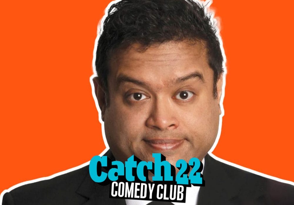 Paul Sinha faces you wearing a suit