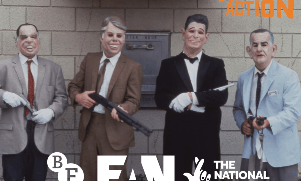 The image shows four men stood in front of a wall. They all of masks on and are wearing suits with shirts and ties each holding guns. To the top right is an orange Art of Action logo. The bottom centre has a white BFI, FAN, and The National Lottery logo.