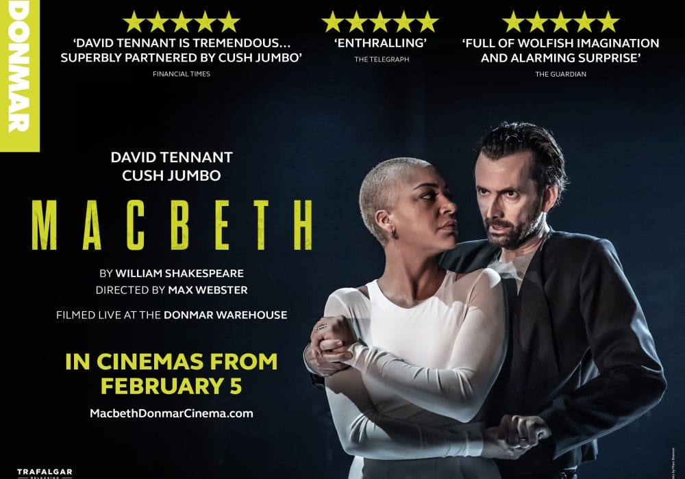 Cinema poster for MACBETH. Text is in wite and lime green. Cush Jumbo a mixed race woman with short blonde hair wearing a white top has her arms crossed over her body holding David Tennant a white male with gelled back dark hair wearing a dark suit jacket and grey t-shirt.