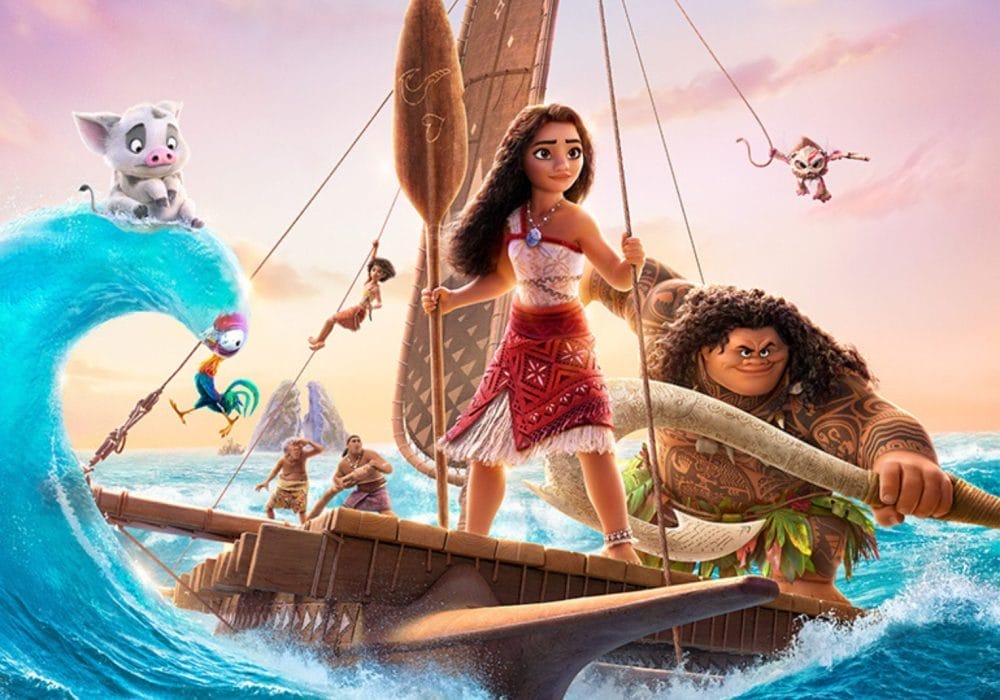 Animated characters from Disney's Moana stand on a wooden raft on a choppy ocean. Moana is at the helm of the raft holding a wooden oar. To her right is Maui holding a large fish hook. To the left of Moana is her pet pig Pua sitting on top of a wave.