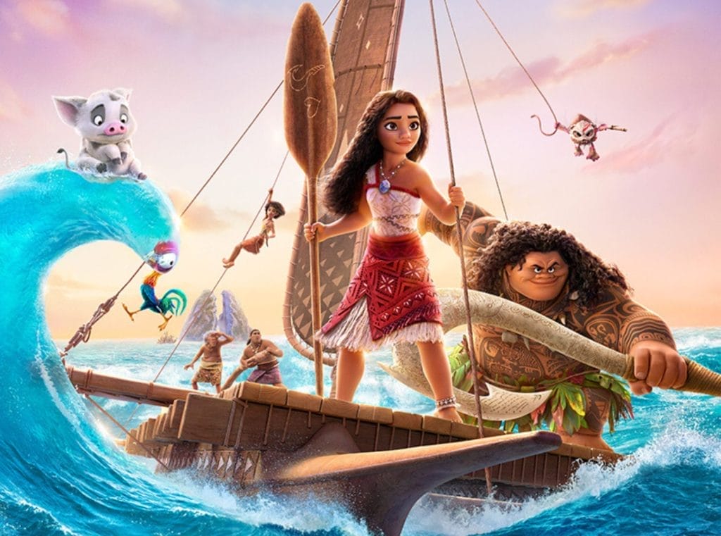 Animated characters from Disney's Moana stand on a wooden raft on a choppy ocean. Moana is at the helm of the raft holding a wooden oar. To her right is Maui holding a large fish hook. To the left of Moana is her pet pig Pua sitting on top of a wave.