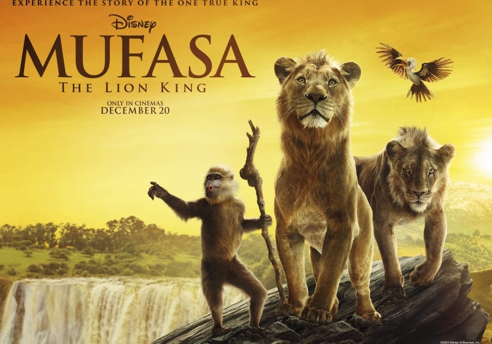 Two lions, and a baboon holding a wooden staff, stand on the edge of a sharp cliff. Text reads: experience the story of the one true king, Mufasa The Lion King