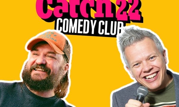 a promotional header for "Catch22 Comedy Club" against a bright yellow background. The club's name appears in bold pink and white letters at the top. Below are photos of two comedians: on the left, a bearded man wearing an orange cap and dark shirt, and on the right, a smiling man with grey hair holding a microphone, wearing what appears to be a t-shirt with "REBEL" visible on it.