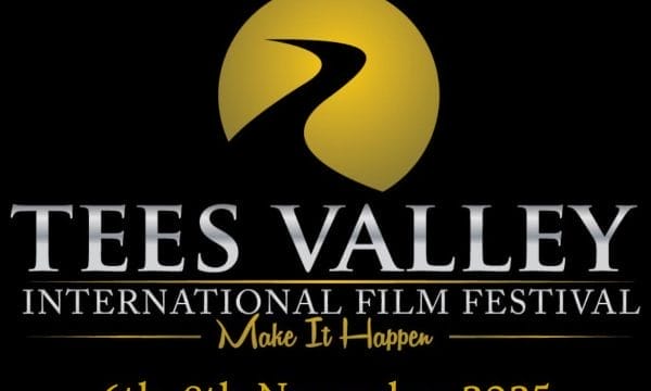 Logo for Tees Valley International Film Festival featuring a stylised road leading into a golden circle, symbolizing a rising or setting sun. Below the logo, the text reads: 'TEES VALLEY INTERNATIONAL FILM FESTIVAL – Make It Happen – 6th-8th November 2025 – ARC Stockton Arts Centre.