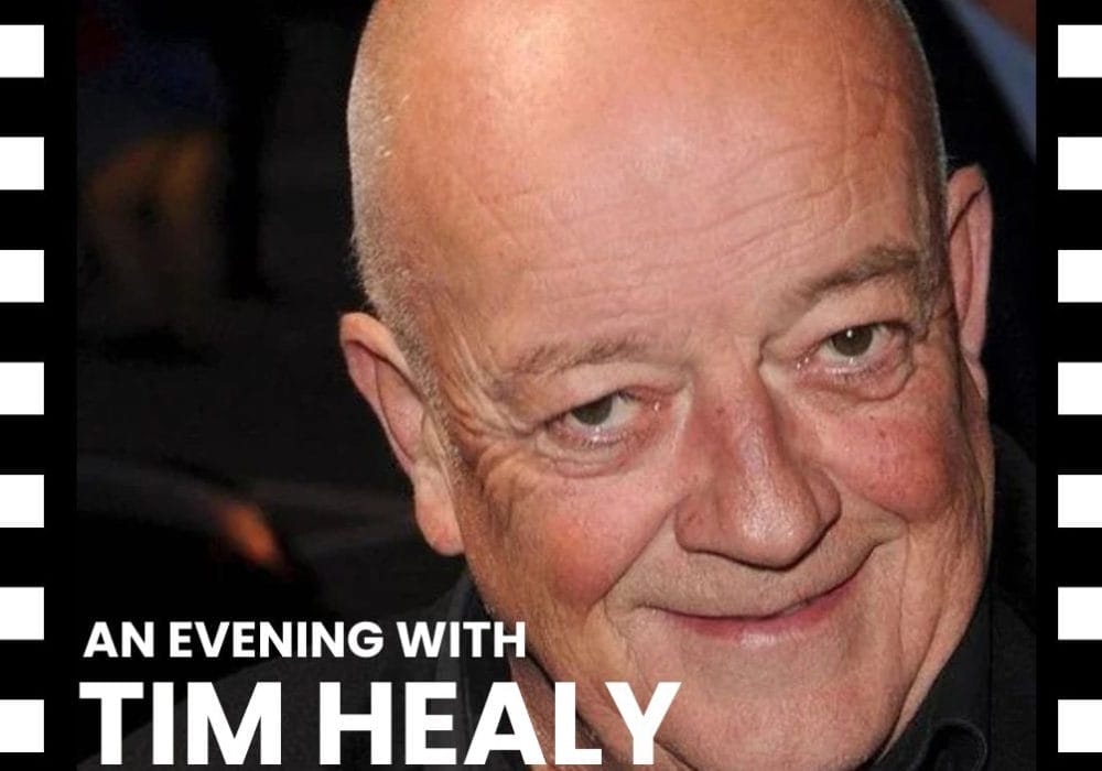 An image of actor Tim Healy smiling.