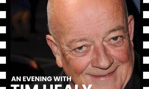 An image of actor Tim Healy smiling.