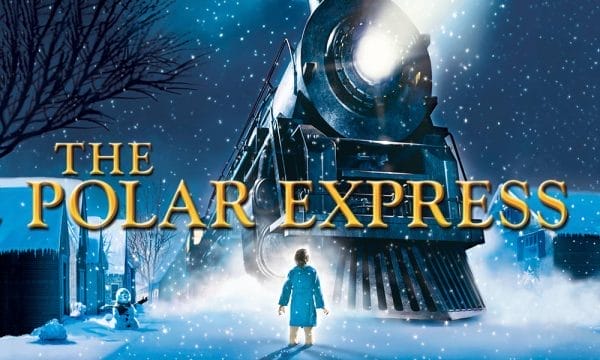 An image of a boy looking up at a large train, the background is covered with snow. In the middle in gold writing it reads 'The Polar Express'.