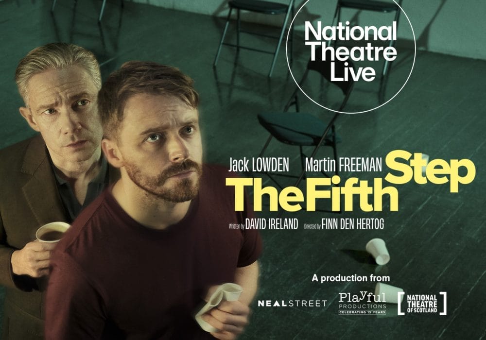 Two men in the foreground against a dark green background with wire mesh fencing. The man in front wears a dark red/burgundy top and holds a white cup, looking directly at the camera with a beard and serious expression. Behind him, an older man with grey hair in dark clothing looks over his shoulder. The National Theatre Live logo appears in a white circle in the upper right. Large yellow text reads "The Fifth Step" with "Jack LOWDEN Martin FREEMAN" above it. Smaller text shows "written by DAVID IRELAND Directed by FINN DEN HERTOG" and production credits for "NEAL STREET", "Playful PRODUCTIONS", and "NATIONAL THEATRE OF SCOTLAND" at the bottom.