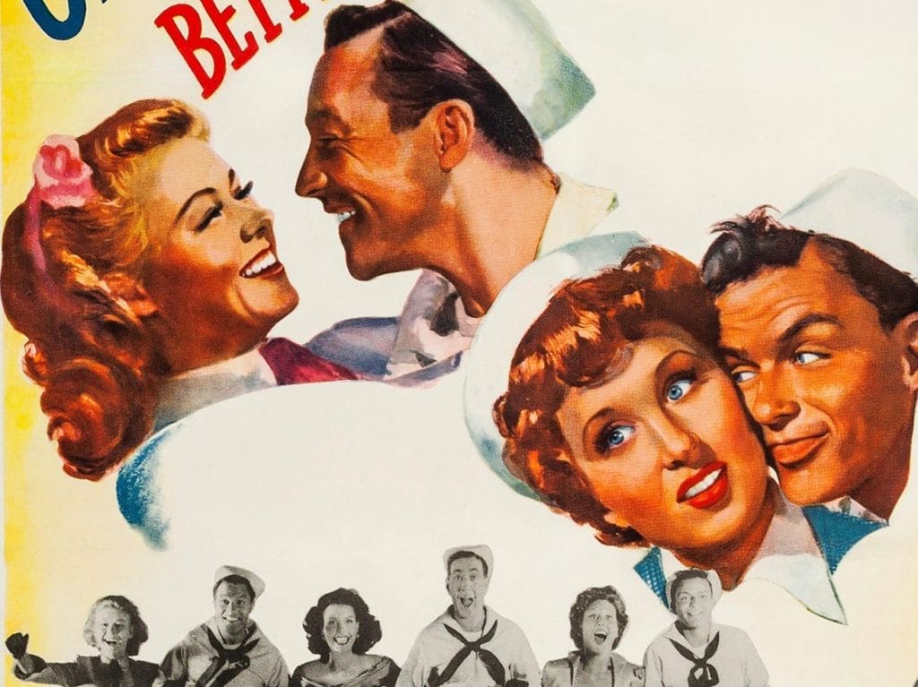 painted portraits of couples in 1940s or 1950s style. The main focus is on two romantic couples rendered in warm, golden tones typical of mid-century illustration. In the upper left, a blonde woman with a pink flower in her hair gazes lovingly at a dark-haired man in what appears to be a sailor's white uniform. In the lower right, another couple is shown - a woman with auburn hair and blue eyes looking at a man, also in naval attire.
