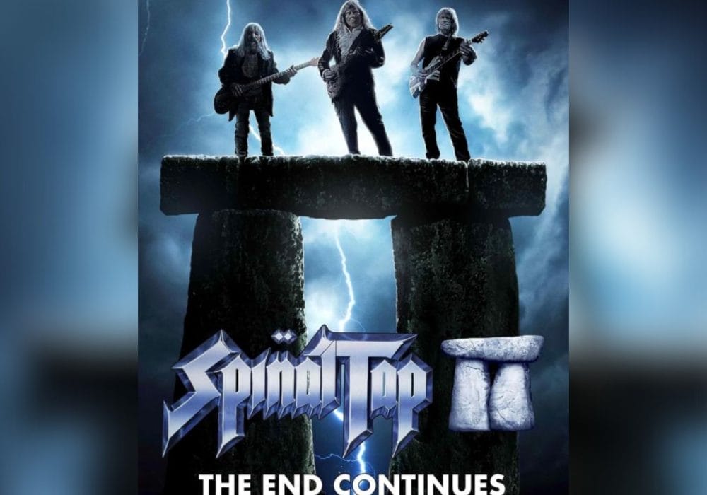 A parody movie poster shows three rock musicians standing on Stonehenge with lightning in the background. The text reads “Spinal Tap II” and “THE END CONTINUES.”