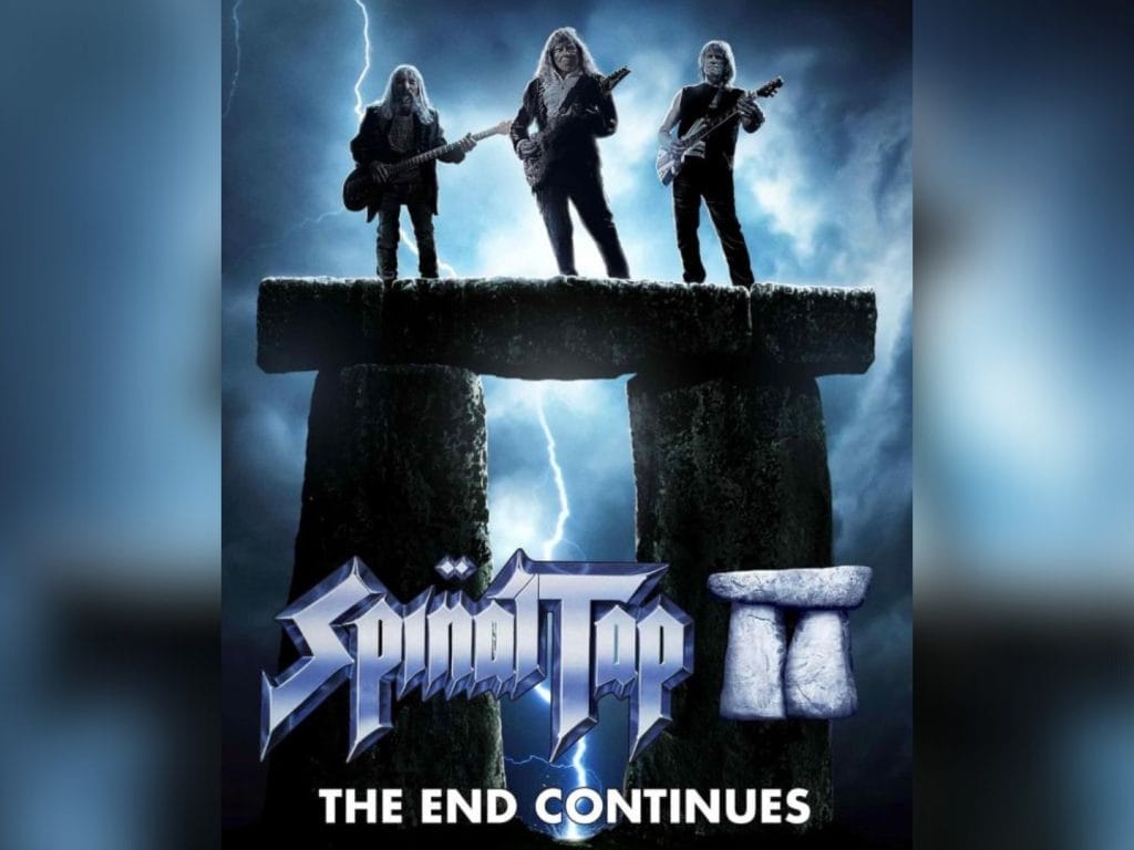 A parody movie poster shows three rock musicians standing on Stonehenge with lightning in the background. The text reads “Spinal Tap II” and “THE END CONTINUES.”