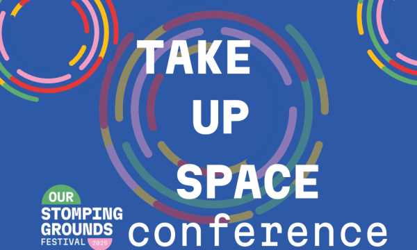 Large white text Take Up Space Conference on a blue background