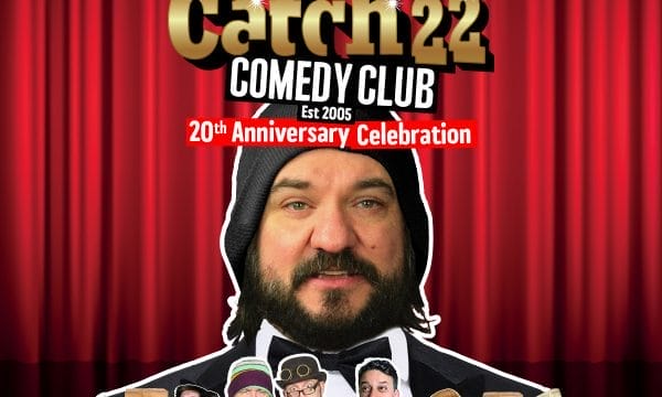 Catch 22 Comedy Club 20th Anniversary Celebration promotional image. Gold lettering logo against red stage curtains. Est 2005. Features headlining comedian in black beanie and bow tie with a lineup of supporting comedians below, including performers with paper bags over their heads for comedic effect