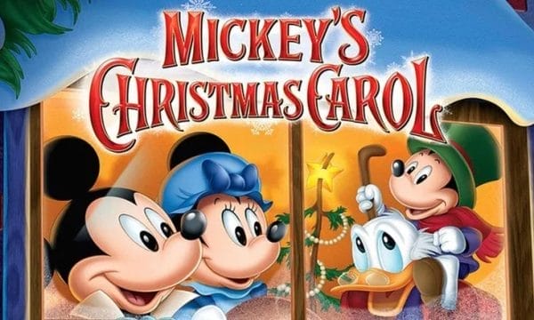 Mickey Mouse and Disney characters gather around a christmas tree