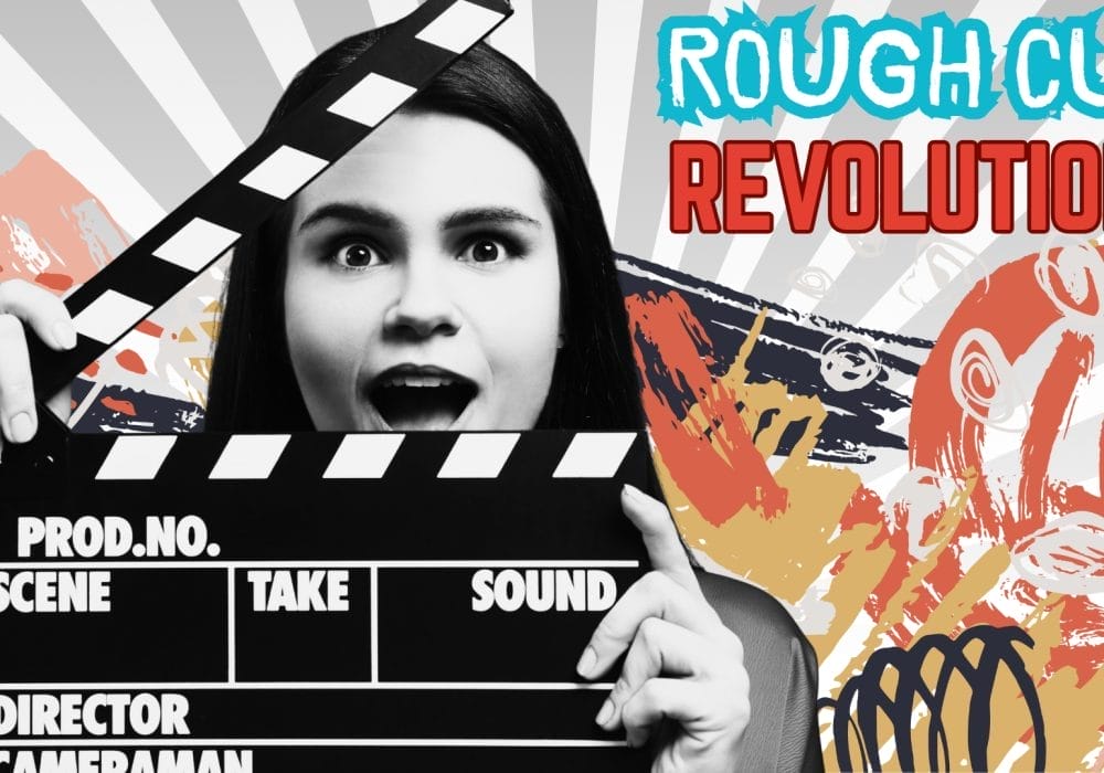 A female actor holding a clapper board