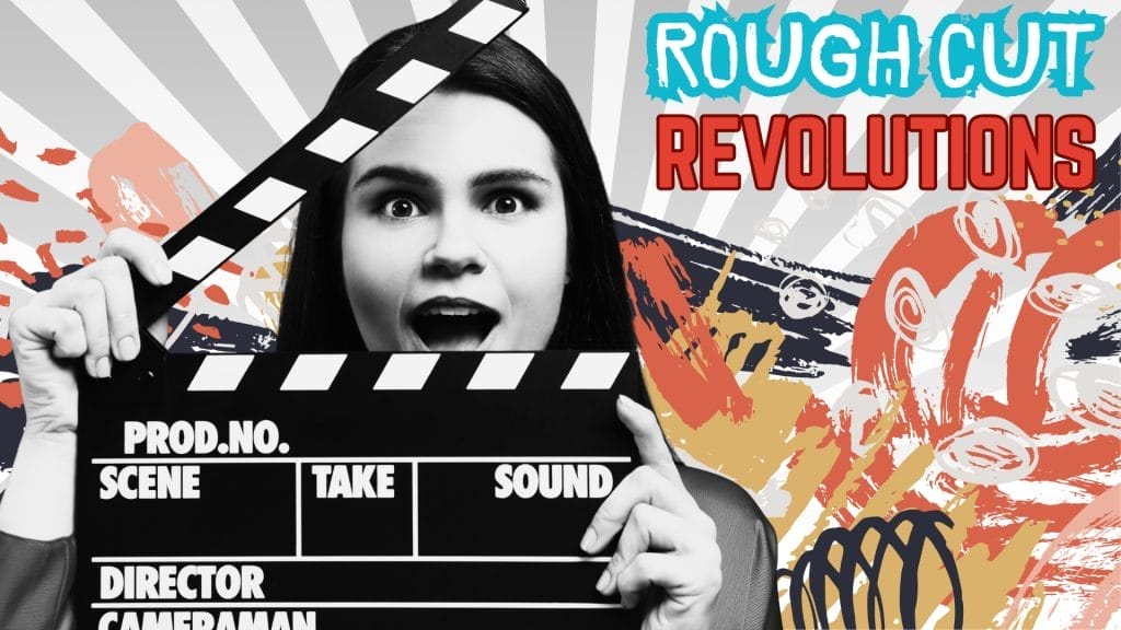 A female actor holding a clapper board