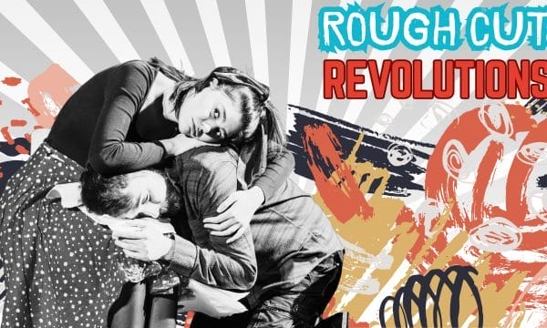 A Female and male actor hugging each other