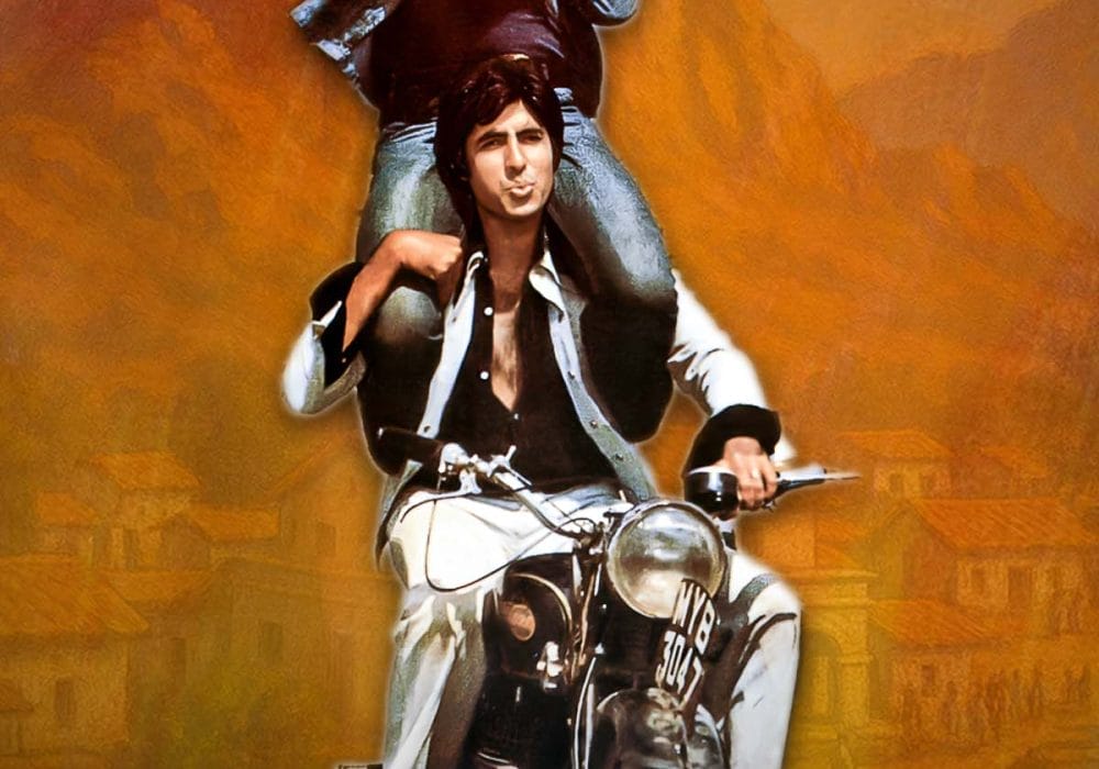 A man on a motorbike wearing a white suit with another man on his shoulders. Orange background. Sholay