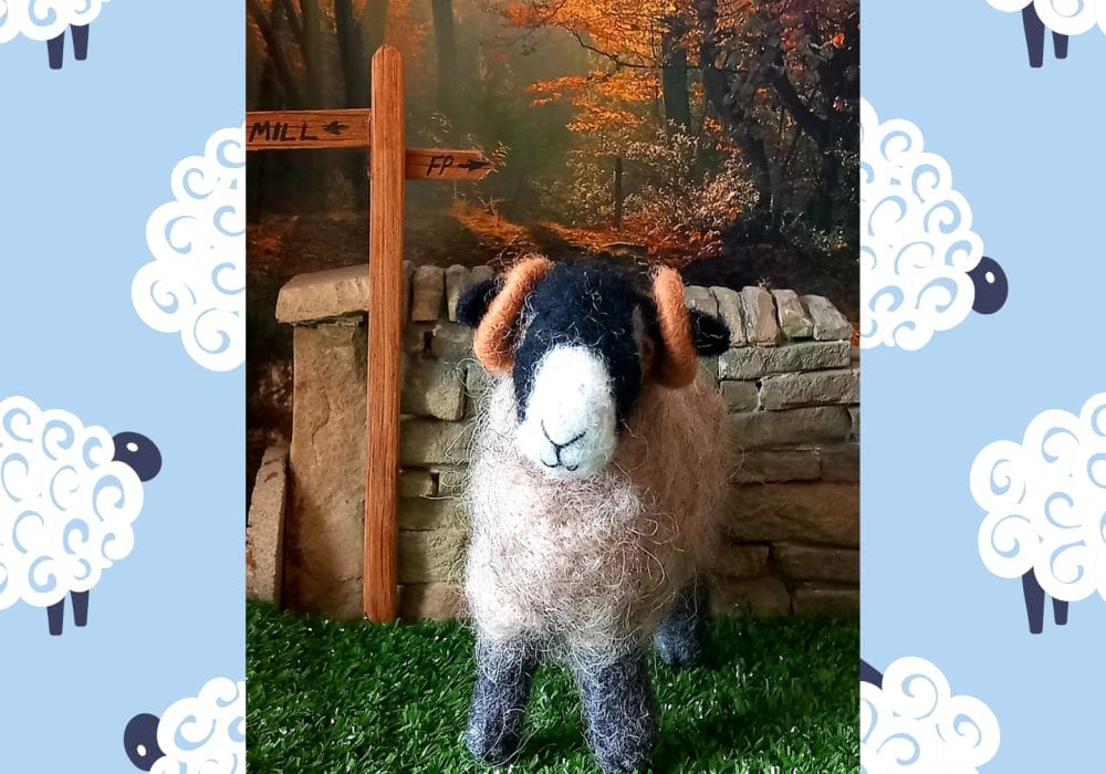 A handmade model of sheep made from felt