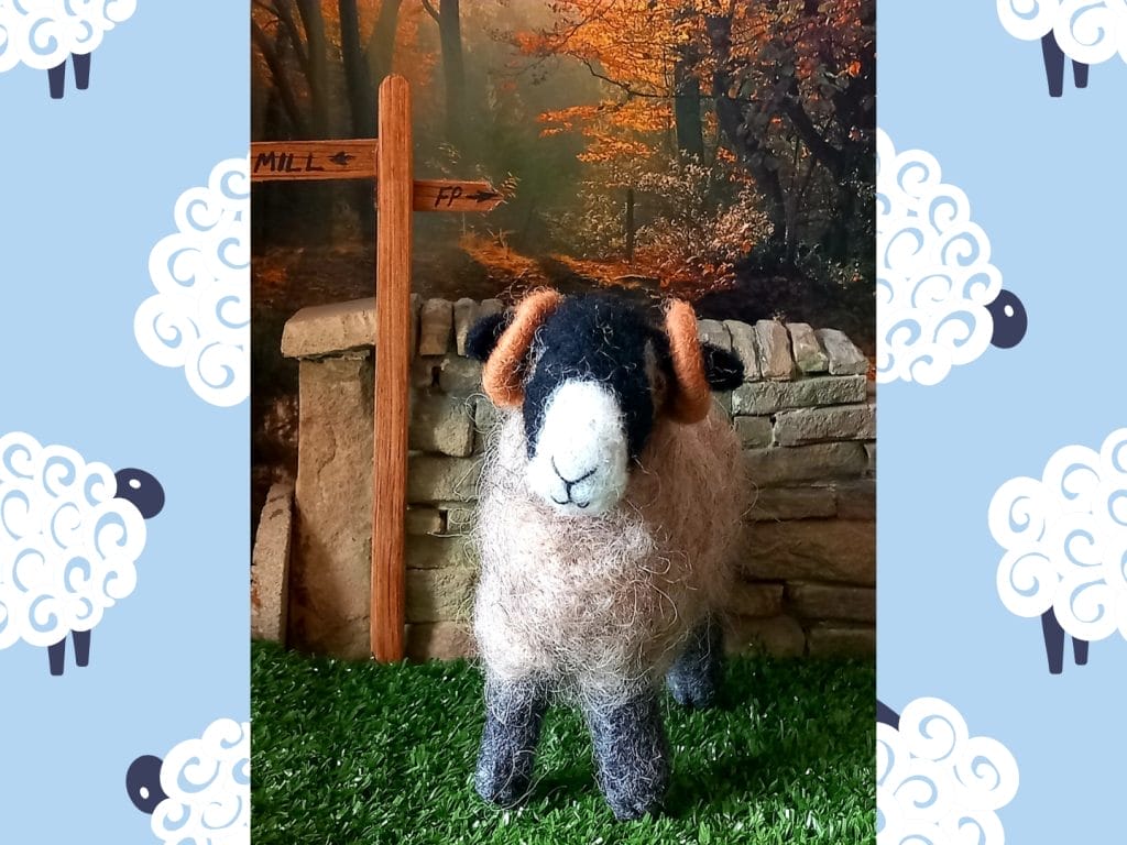 A handmade model of sheep made from felt