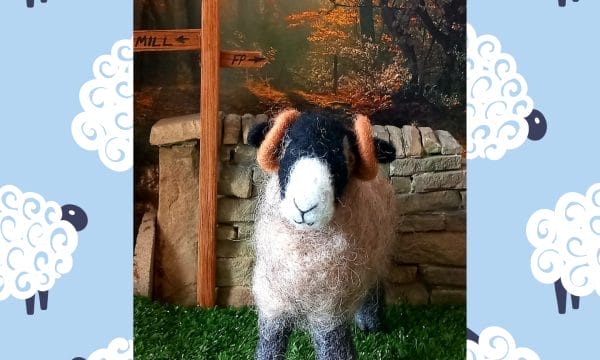 A handmade model of sheep made from felt