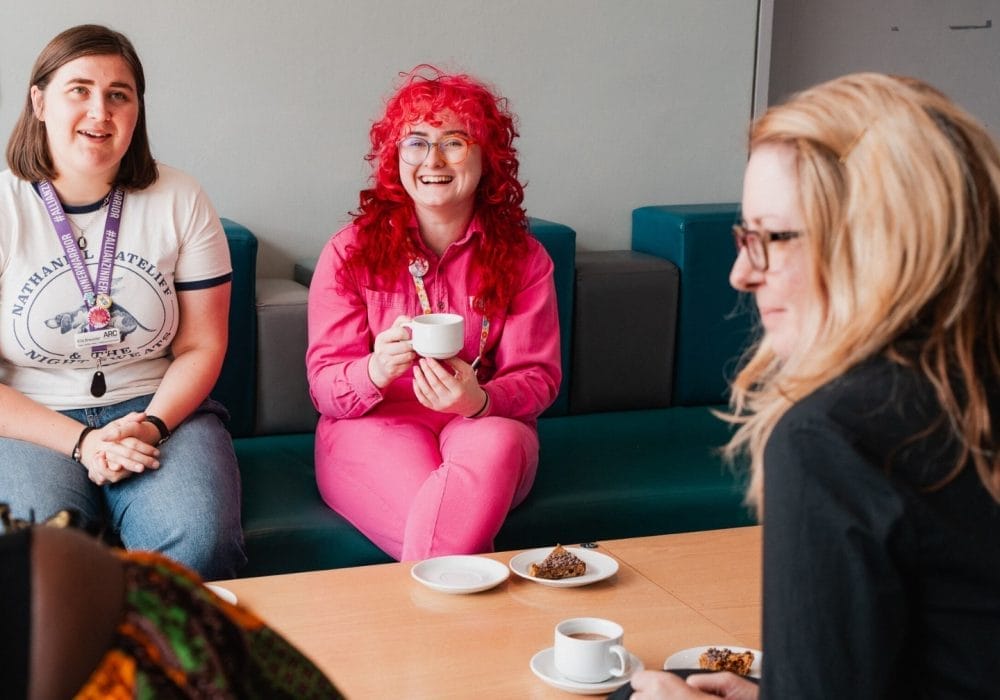 A group of community creative artists having a meeting