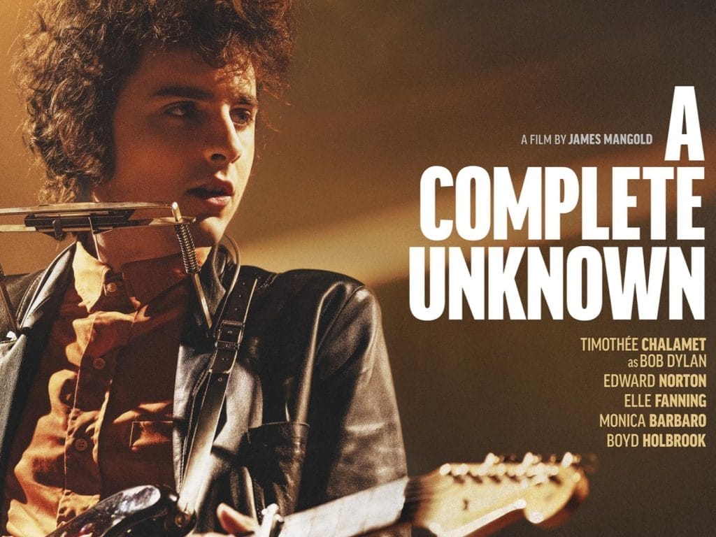 An actor playing the part of folk musician Bob Dylan